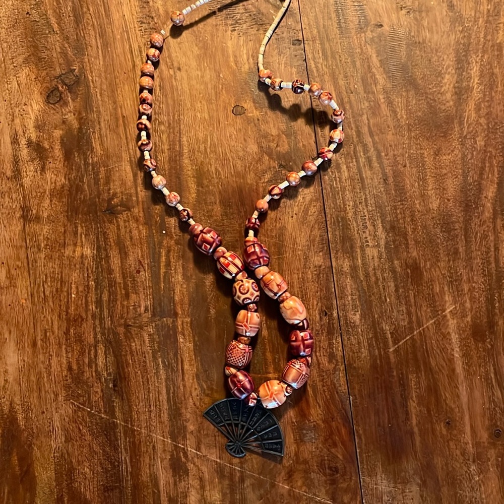 Beaded necklace with unusual beads